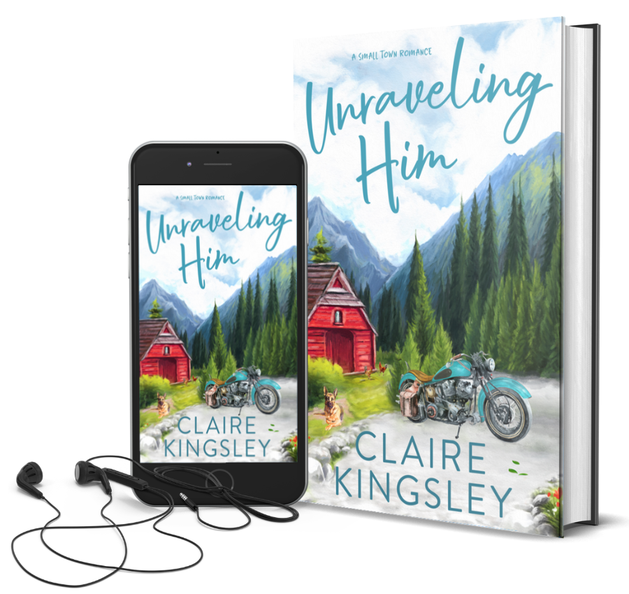 The book cover for Unraveling Him, a small-town romance by Claire Kingsley, is an illustrated image of a motorcycle parked on a dirt road with tall pine trees and mountains in the background. There is a small red house off to the side and a German Shepherd dog laying in the yard. Next to the book is a phone showing the cover with a pair of wired earbuds.
